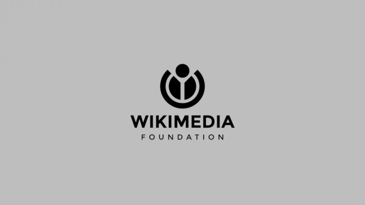 Gri zemin üzerinde siyah Wikimedia Foundation logosu